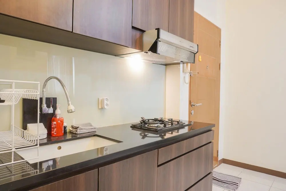 Nice and Homey 1BR at Maple Park Sunter Apartment By Travelio