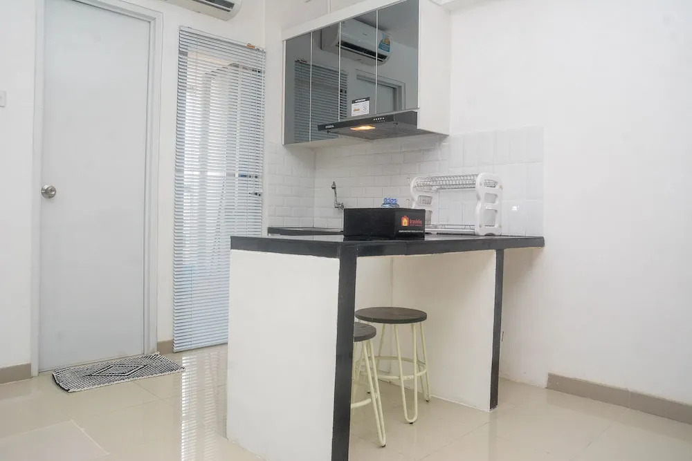 Elegant and Comfy Studio at Bassura City Apartment By Travelio