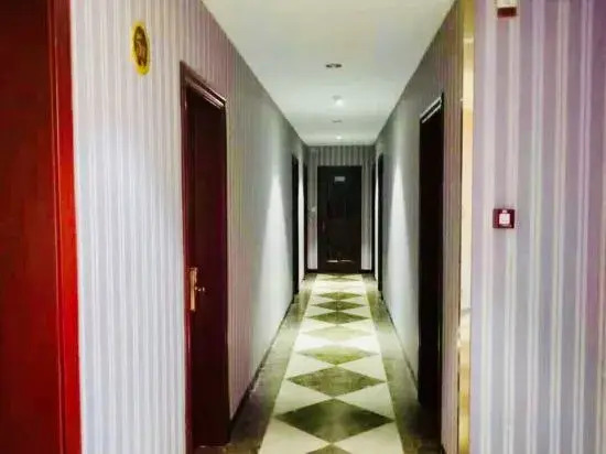 7 xing Ge Business Hotel