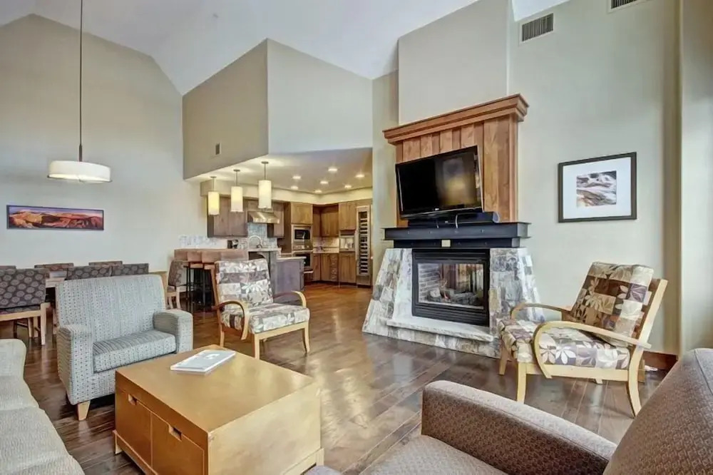 Expansive 4 Bedroom Ski in, Ski out One Ski Hill Residence Located at the Base of Peak 8 with Beautiful Views