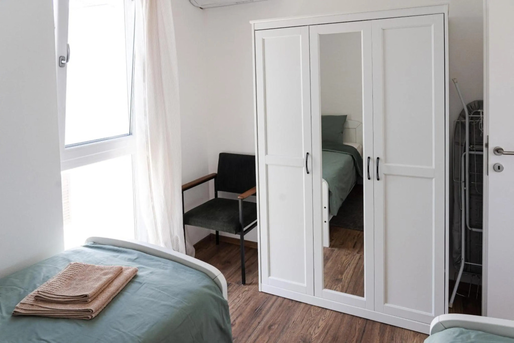 Station 22 - Brand new apartment with a terrace and private parking