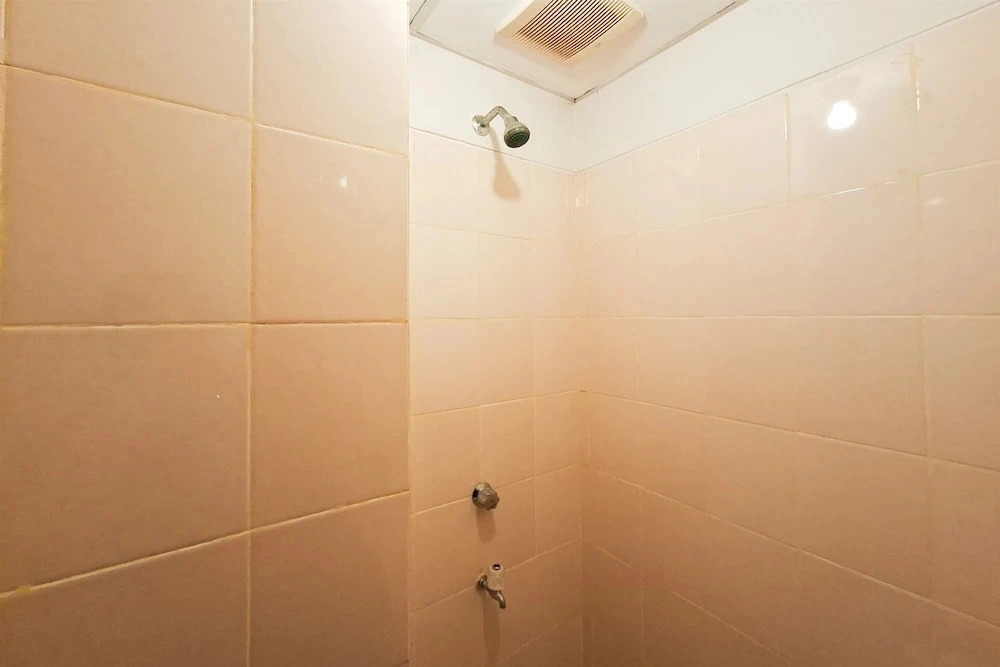 Spacious And Warm Combined Studio Room At Apartment Serpong Greenview