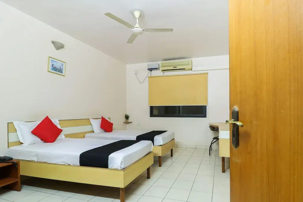 Capital O 62901 Online Suites by Shanthiniketan Homes