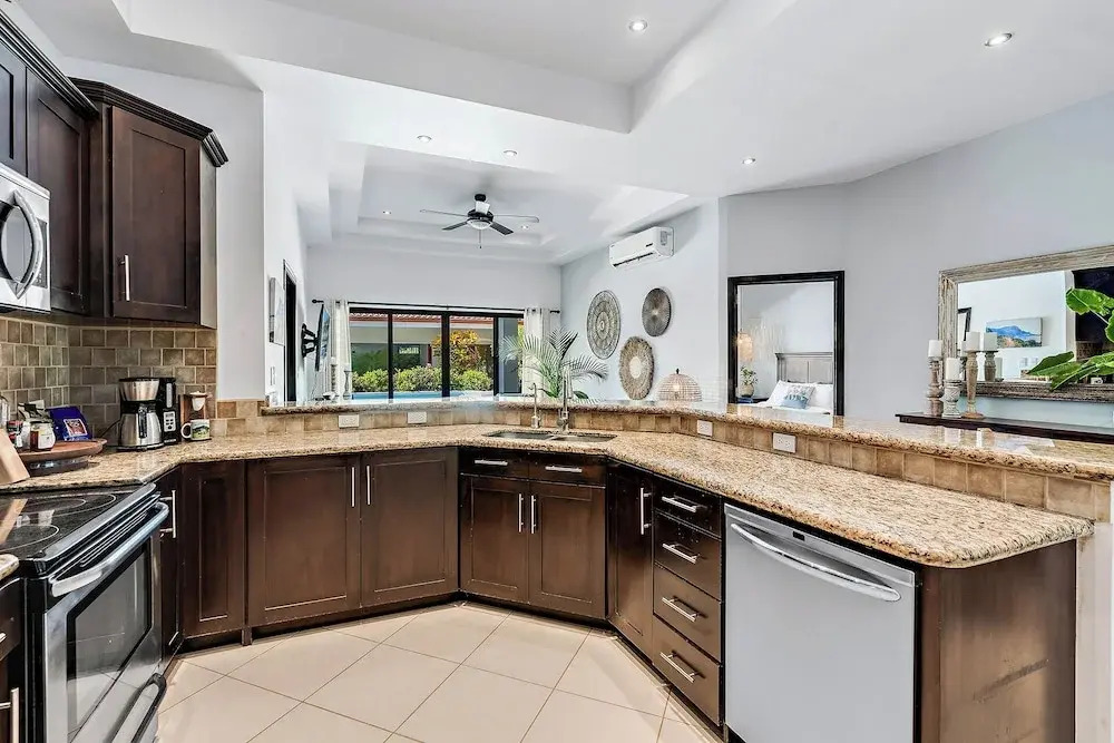Stylish Home with Chic Decor, Luxury Amenities & Tropical Outdoor Oasis with Sparkling Private Pool
