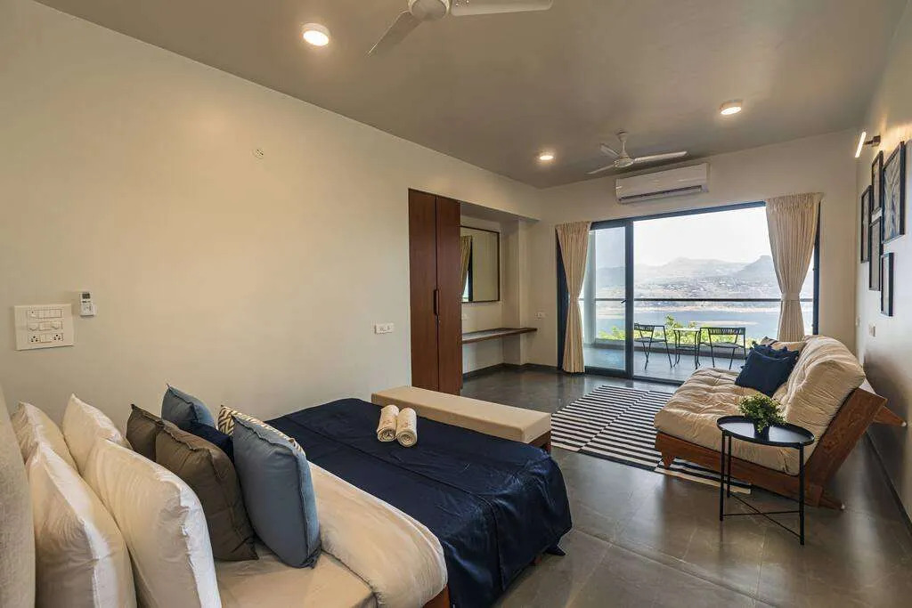 SaffronStays Ahilya Waters - 3BR Pawna villa, infinity pool, 270 terrace views, bonfire & AD-featured estate