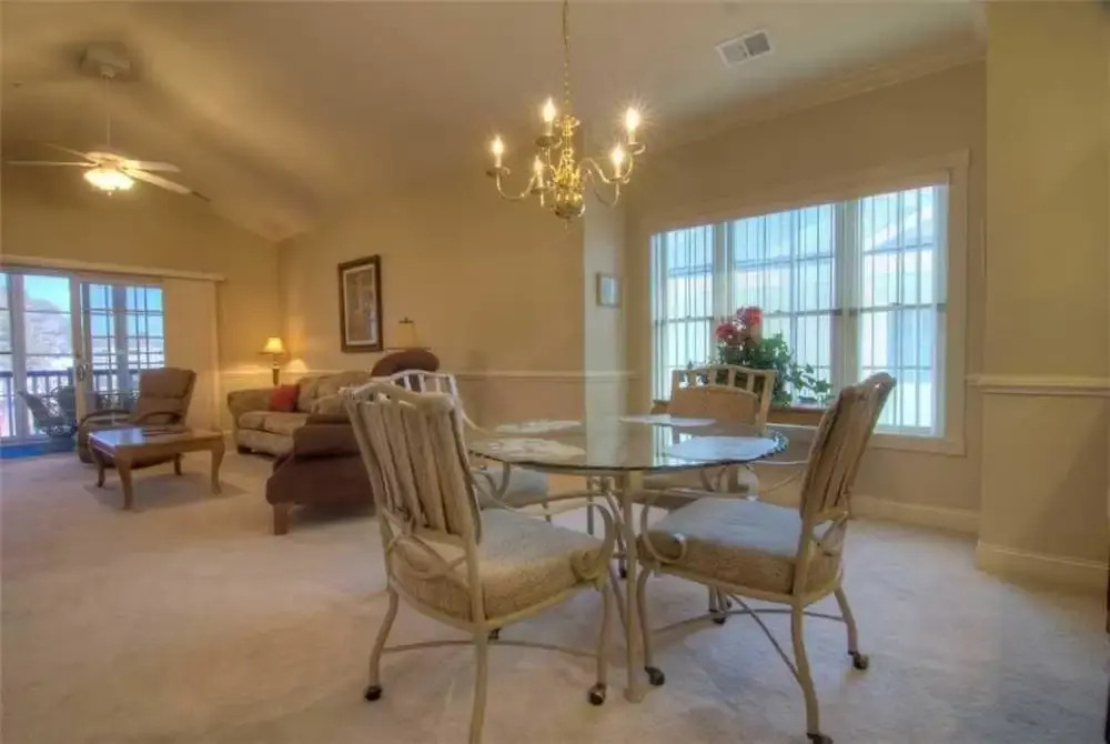 Magnolia Pointe 305-4889 Condo