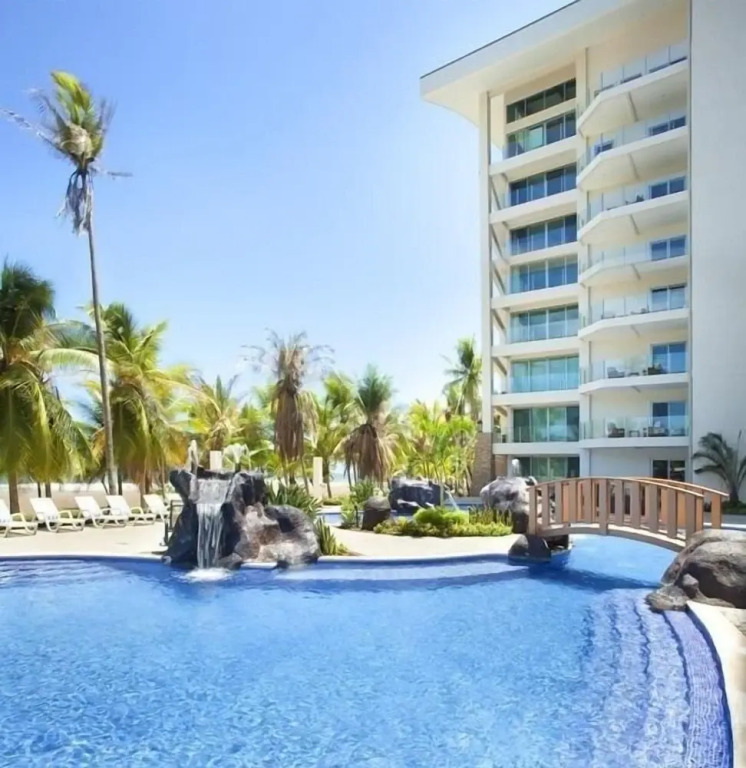 Elegant Beachfront Condo at Diamonte del Sol - 801s by RedAwning