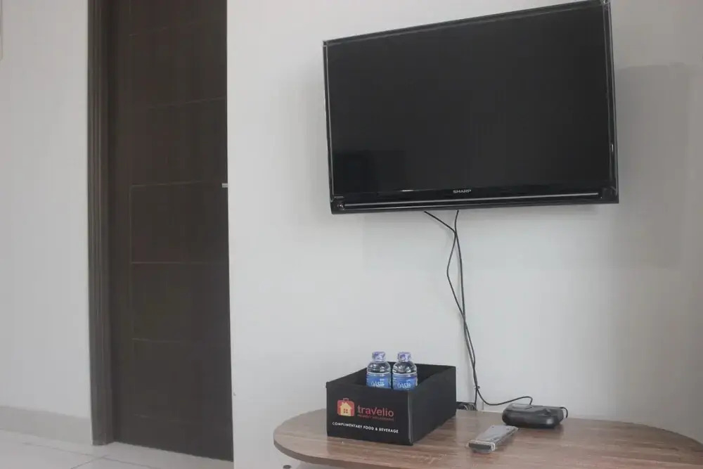 Bright and Relaxing 2BR Apartment at Mekarwangi Square Cibaduyut By Travelio