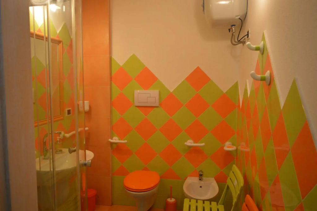 Apartment surrounded by greenery 5 minutes on foot from the beaches of Baia Caddinas and the large s-S'Abba e sa Pedra