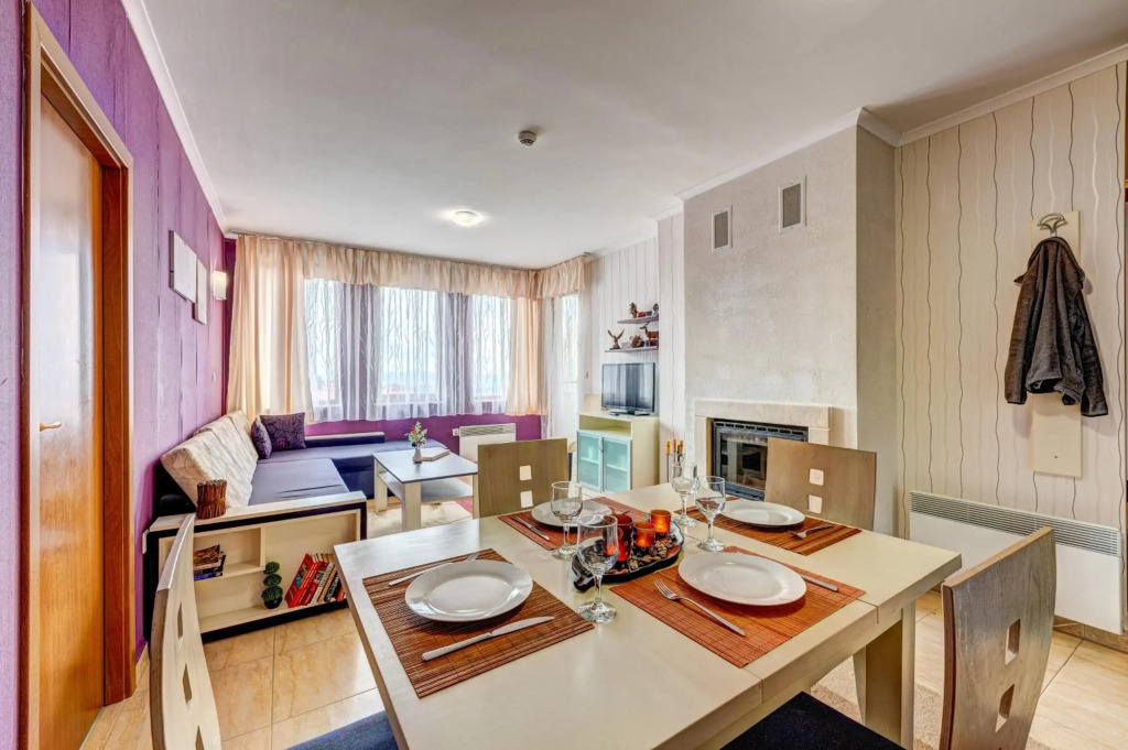 Colorful 2BD Apartment with Indoor Fireplace and Mountain View
