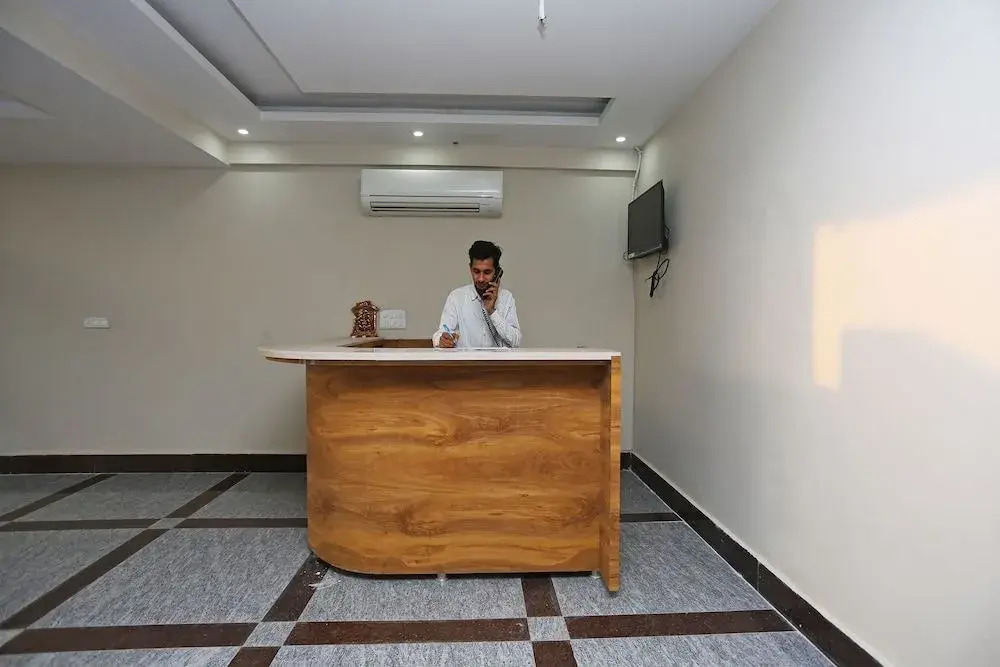 OYO 24626 Palm Garden Suites
