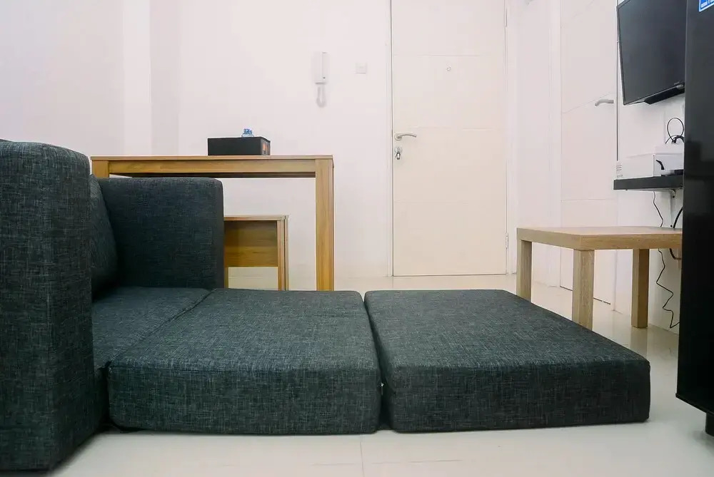 2BR Minimalist Bassura City Apartment By Travelio