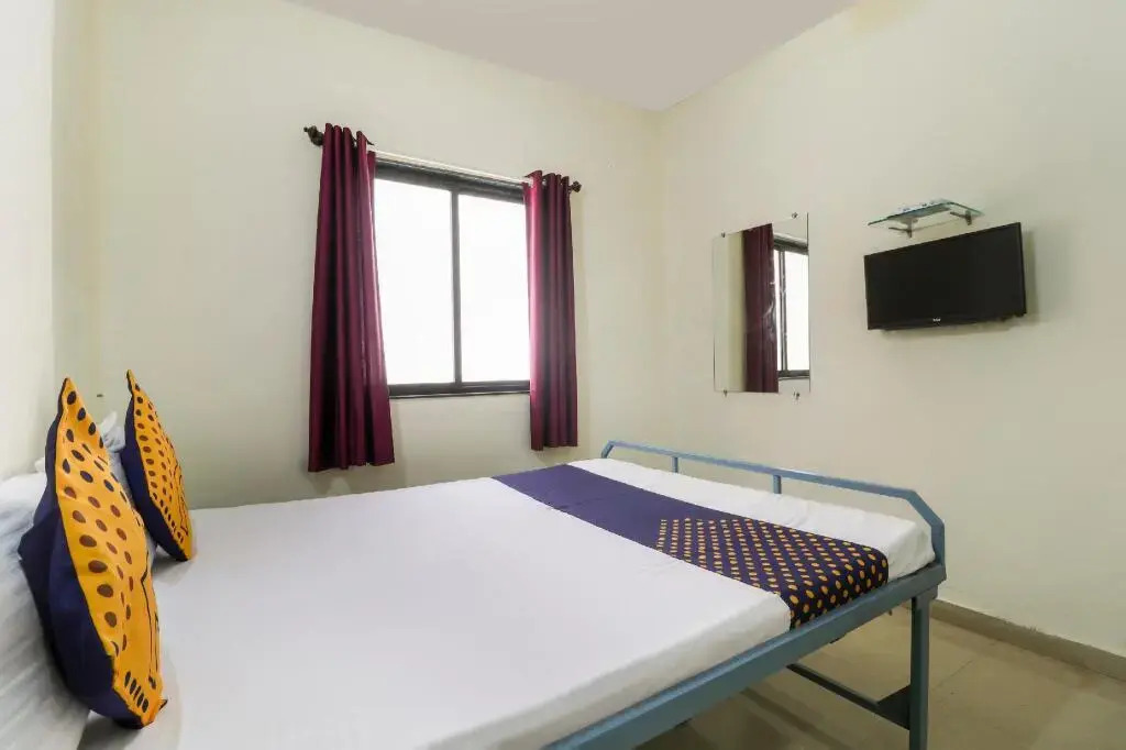 Sai Sidhi Lodge by OYO Rooms