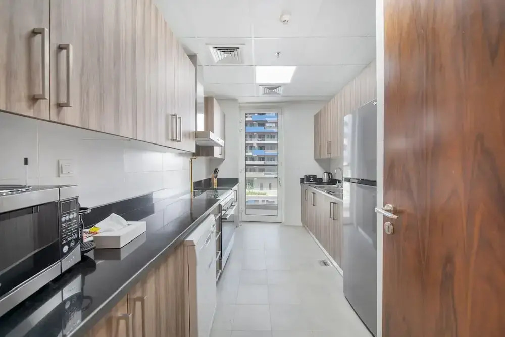 Luxe Apartments near Dubai Mall, Burj Khalifa - Pool, Gym, & Parking by Sojo Stay