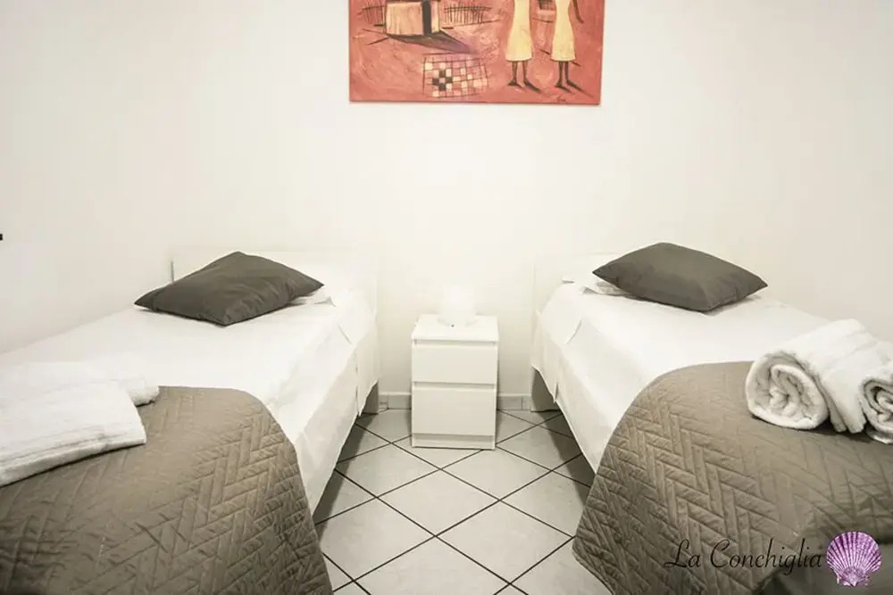 Casa la conchiglia sulla spiaggia