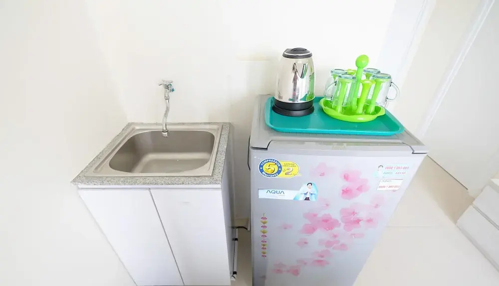 Furnished Studio with Comfortable Design Green Pramuka Apartment