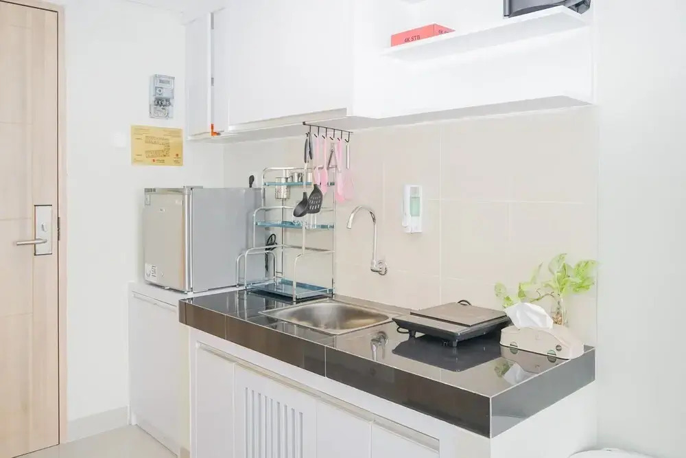 Homey and Minimalist Studio Padina Apartment