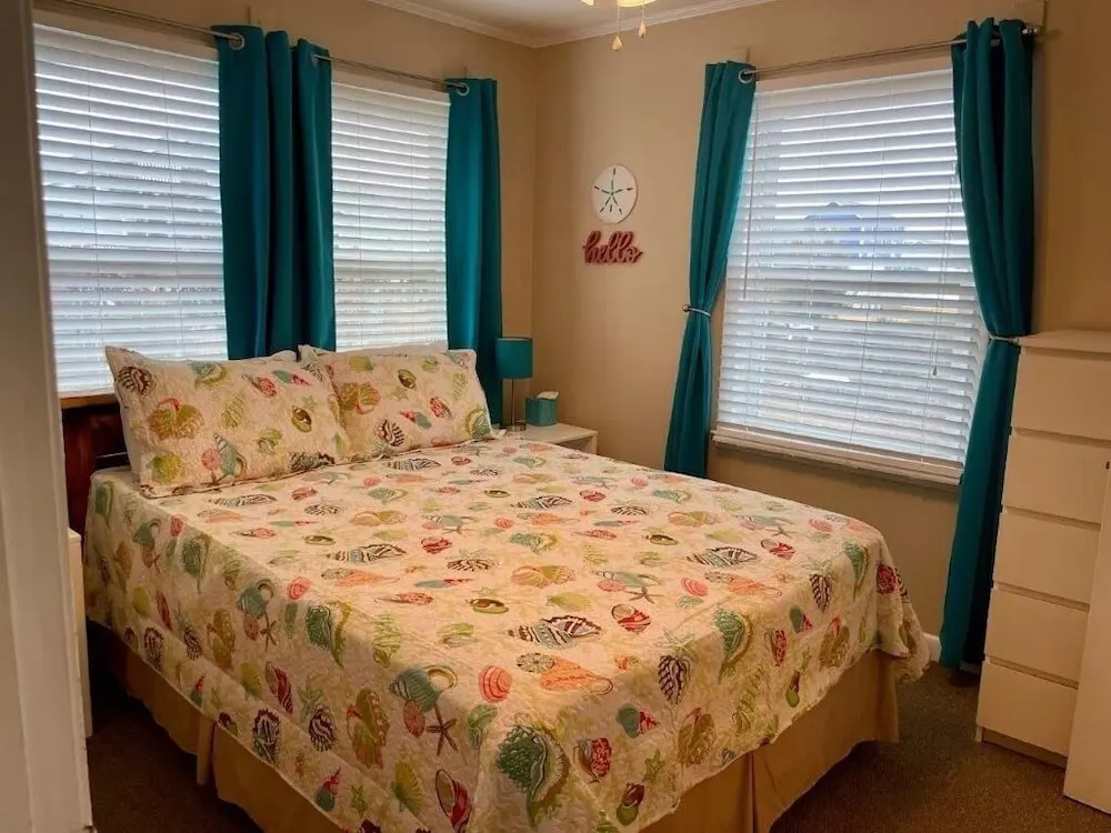 Sandy Bottoms 4 Bedroom Home by RedAwning