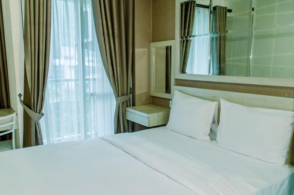 Homey And Warm Studio Room At Tifolia Apartment