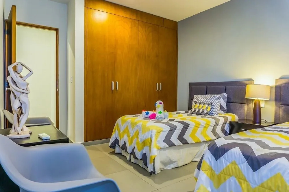 Lunada 314 Modern Playa del Carmen Condo with Tropical Garden View by RedAwning
