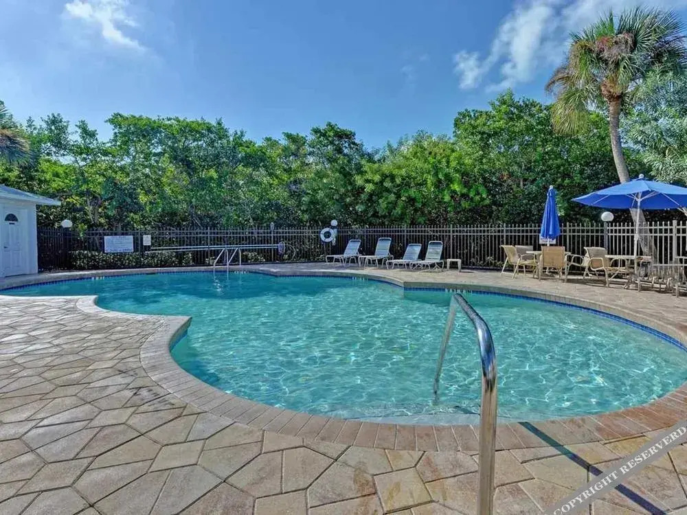 Sandy Point Condominiums by A Paradise Vacation Rentals