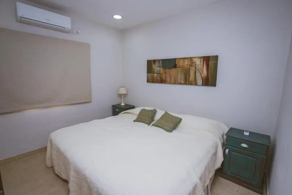 Río Arriba Suites & Apartments & Restó