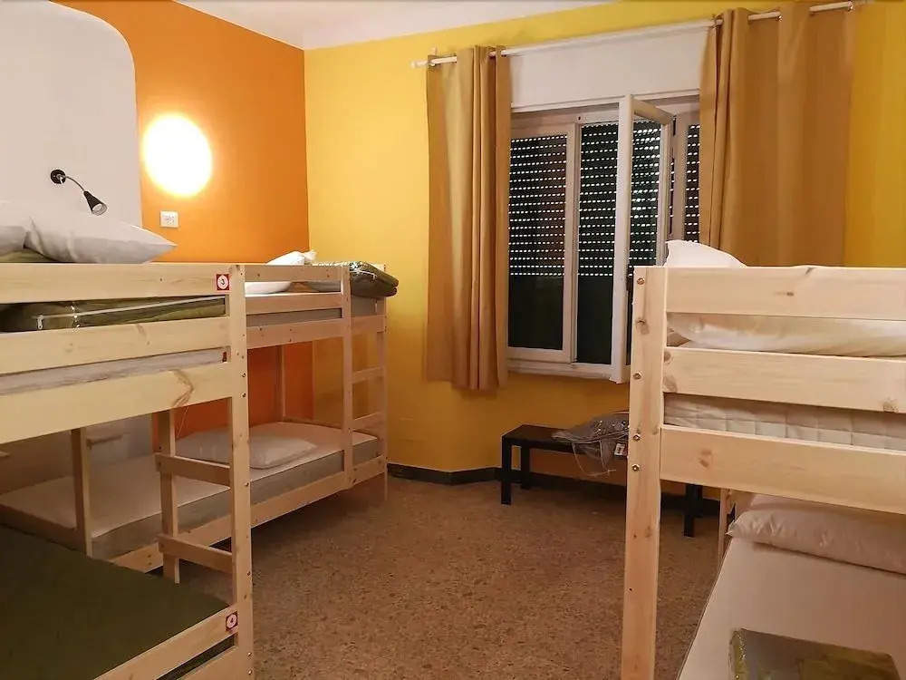 pisa train station hostel