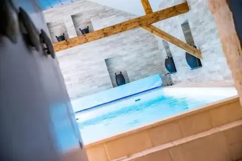 Chambres dHôtes et Suites à La Ferme de lOudon & SPA