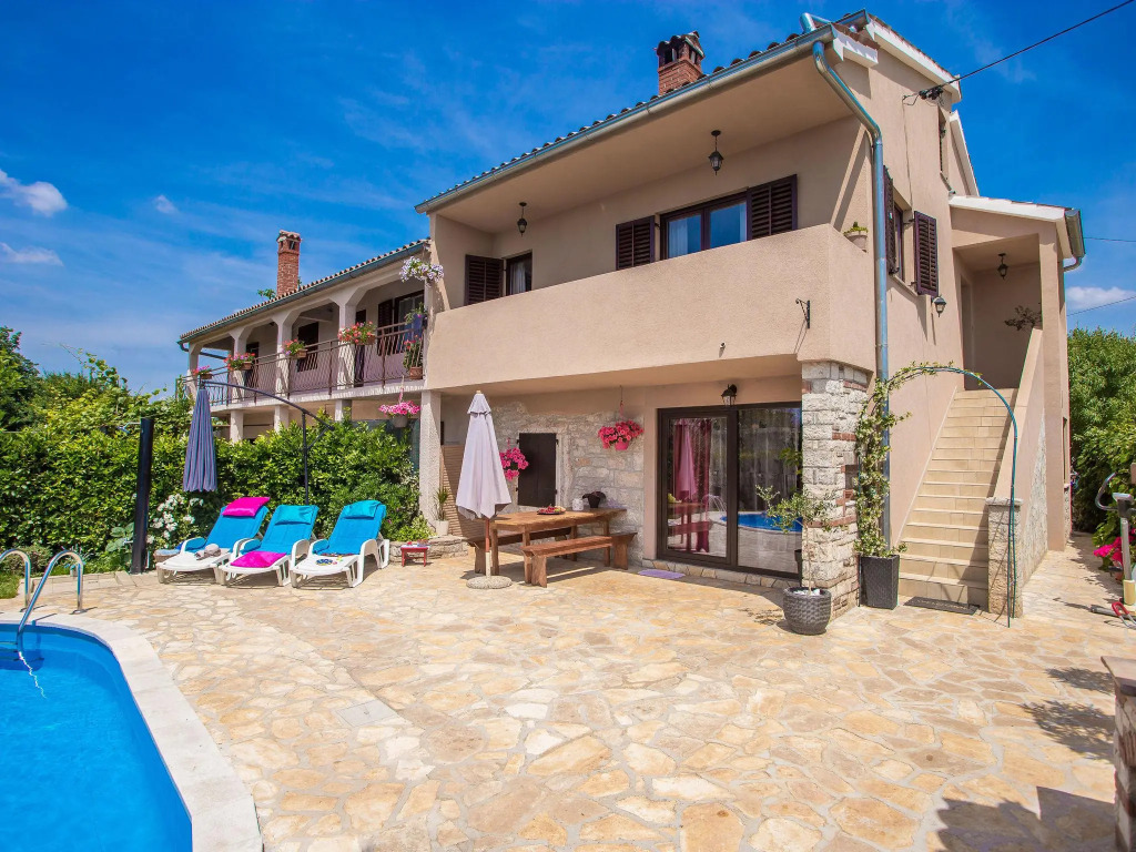 Nicely decorated semi-detached house with pool and  fenced yard