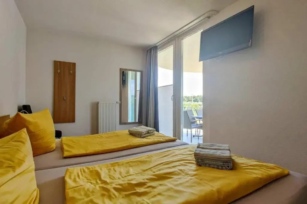 Ferienwohnung-308-Hohe-Lith-Duhnen-mit-eigenem-Strandkorb-am-Strand