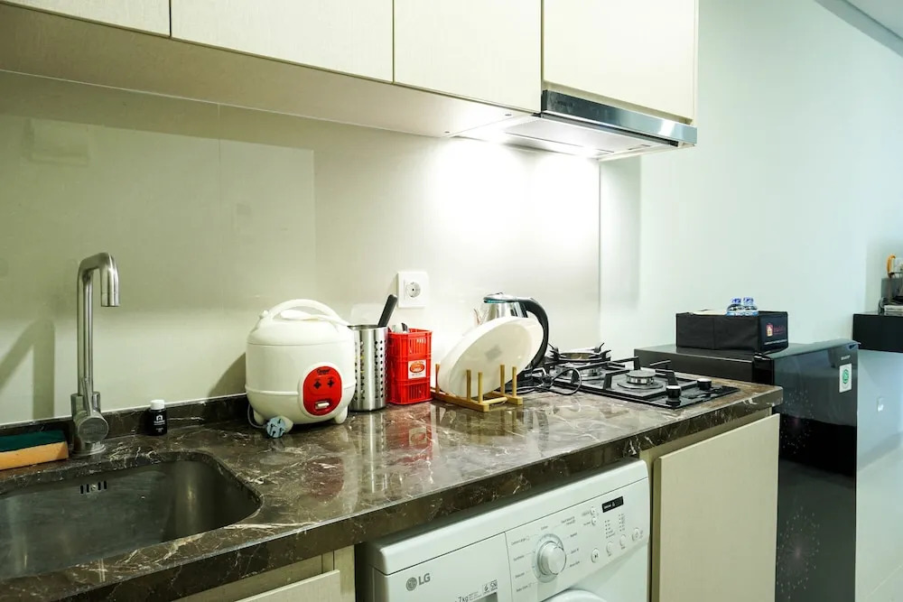 Modern with City View @ Studio Puri Mansion Apartment By Travelio