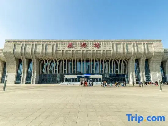 Tuyuan Seaview LOFT Holiday Apartment (Weihai Ferry Terminal Huafa Xintiandi Branch)