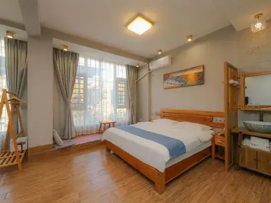 Xinping Xiaoguaijia Inn