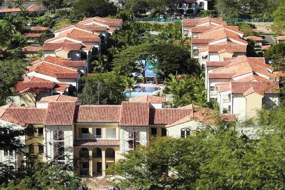 Ground-floor unit in front of lazy river pool at Pacifico in Coco