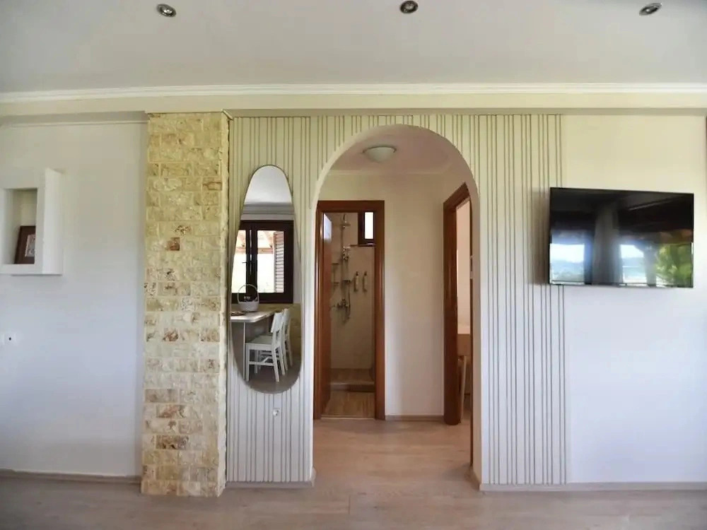 Spacious Beachfront Retreat With Large Garden in Ormos Panagias