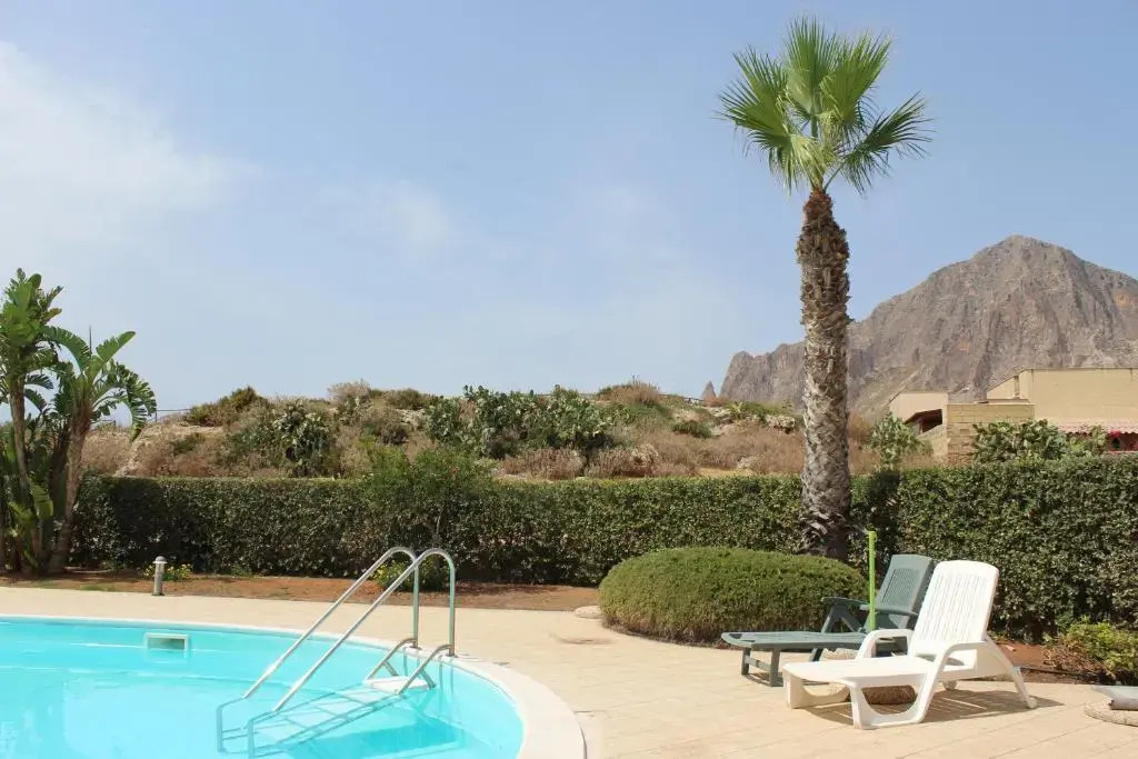 Casa Vacanze Libeccio - Villetta con giardino e piscina condominiale