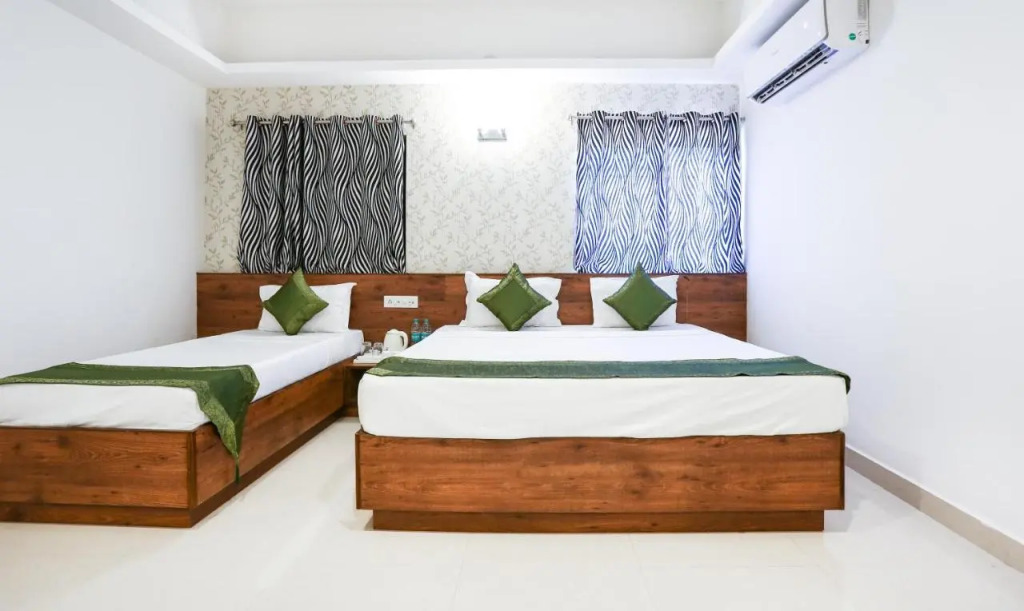 Treebo Comforts Inn, University Road Deralakatte