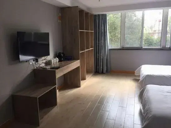 Pinghu liduo sheng business hotel