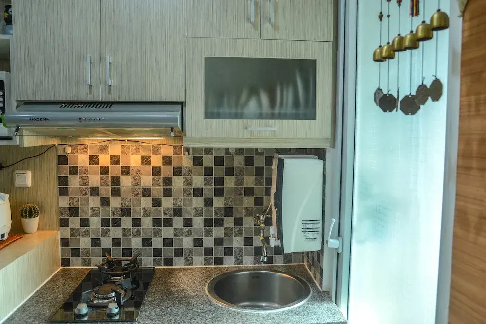 1 Bedroom at Green Pramuka Apartment by Travelio