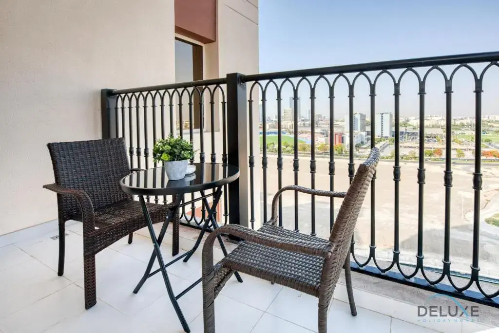 Sunny 1BR at Canal Residences West Dubai Sports City by Deluxe Holiday Homes