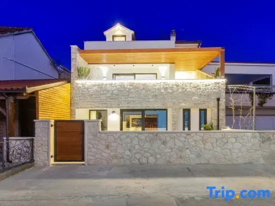 Seafront villa Kupinica with private indoor Pool