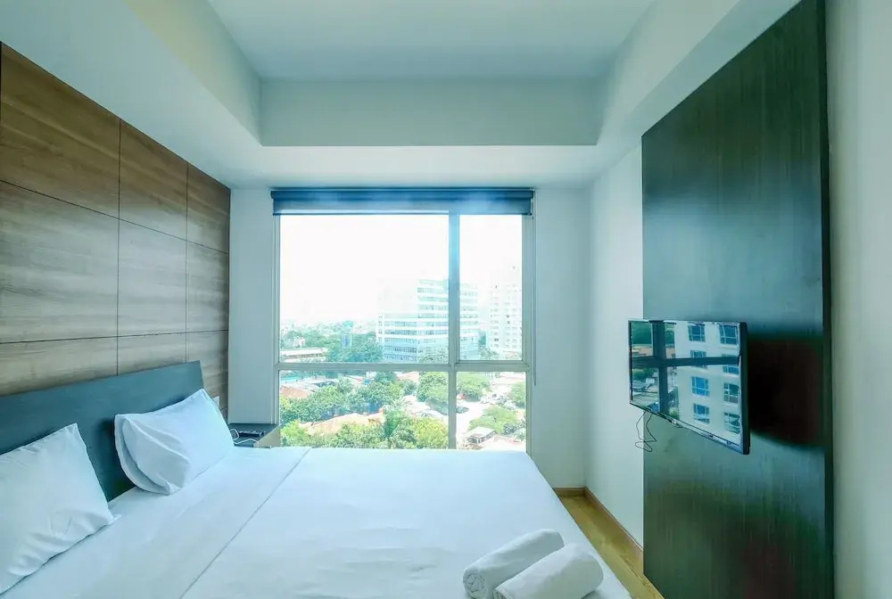 Best Location and Modern 2BR at Casa Grande Apartment