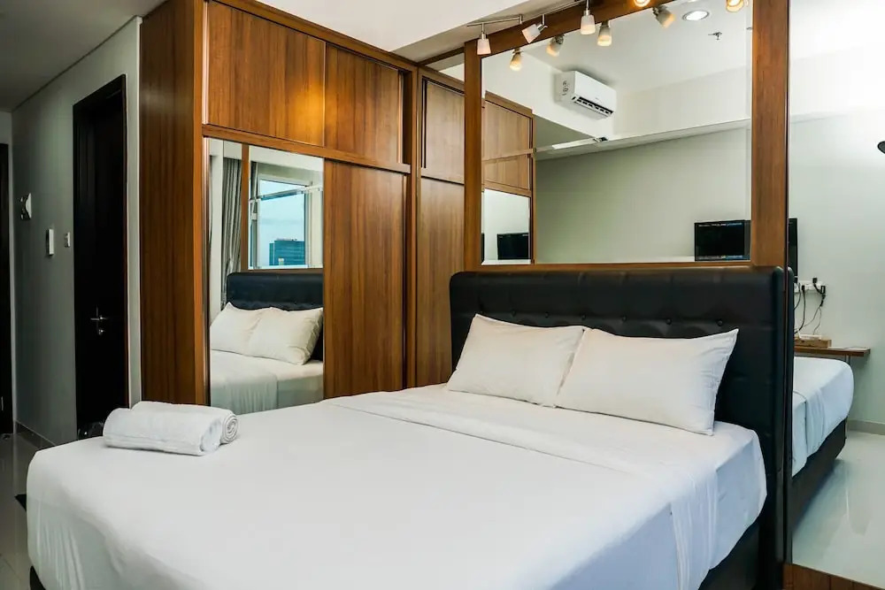 Minimalist Studio Room at Puri Mansion Apartment