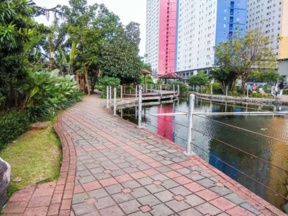 Homey and Relaxing 2BR Green Pramuka Apartment