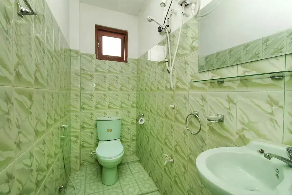 OYO 443 Happy Coconut