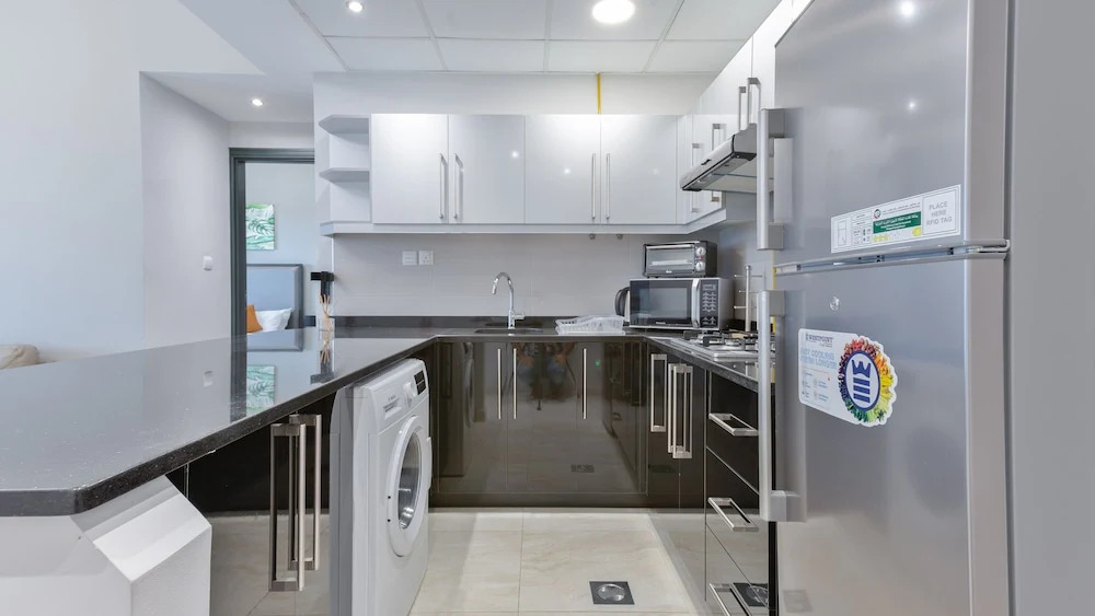 Luxury StayCation - Vibrant 1BR Apartment With Pool and Huge Balcony
