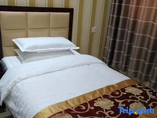 Mizhi Xiaocheng Business Hotel