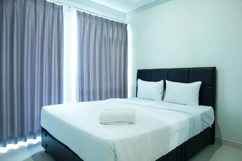 Modern with City View @ Studio Puri Mansion Apartment By Travelio
