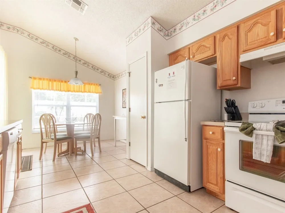 3 Bedroom Home With Private Screened Pool With Rock Waterfall Feature and Gameroom by Florida Dream Homes