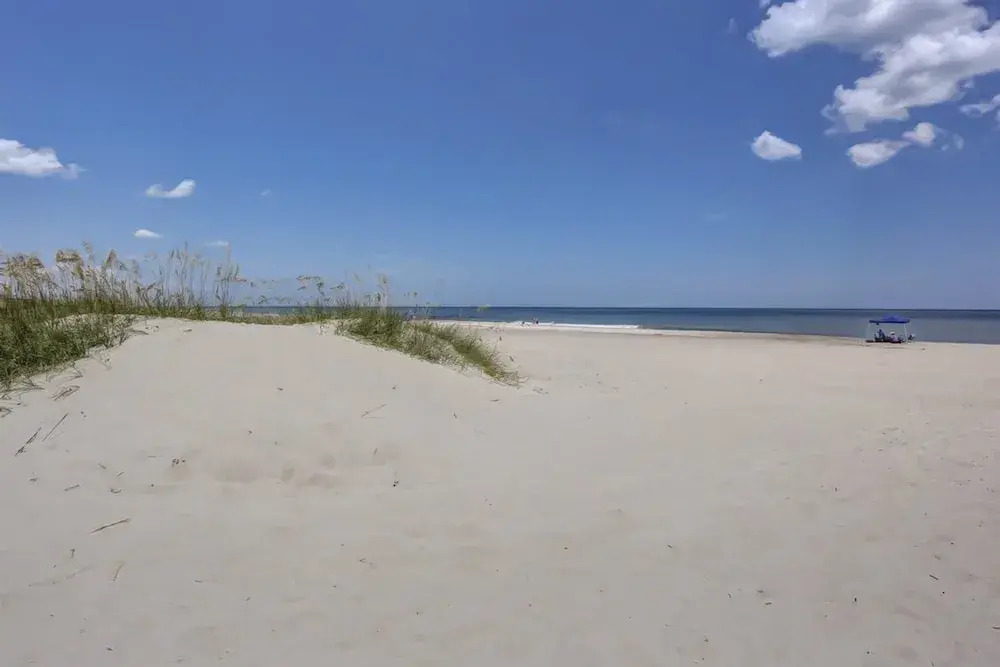 Home Near the Beach & Golf With Inviting Patio, Fireplace, AC, & Washer/dryer